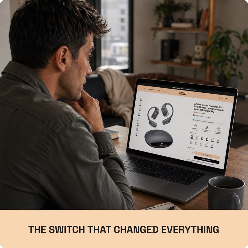 Man browsing the Groovz Plus Open-Ear product page in grey on his laptop